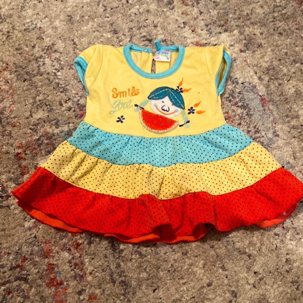 baby dress will fit 6-9 months